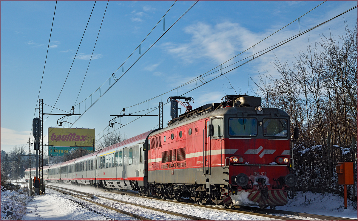 Electric loc 342-014 pull EC158 'Croatia' through Maribor-Tabor on the way to Vienna. /2.1.2015