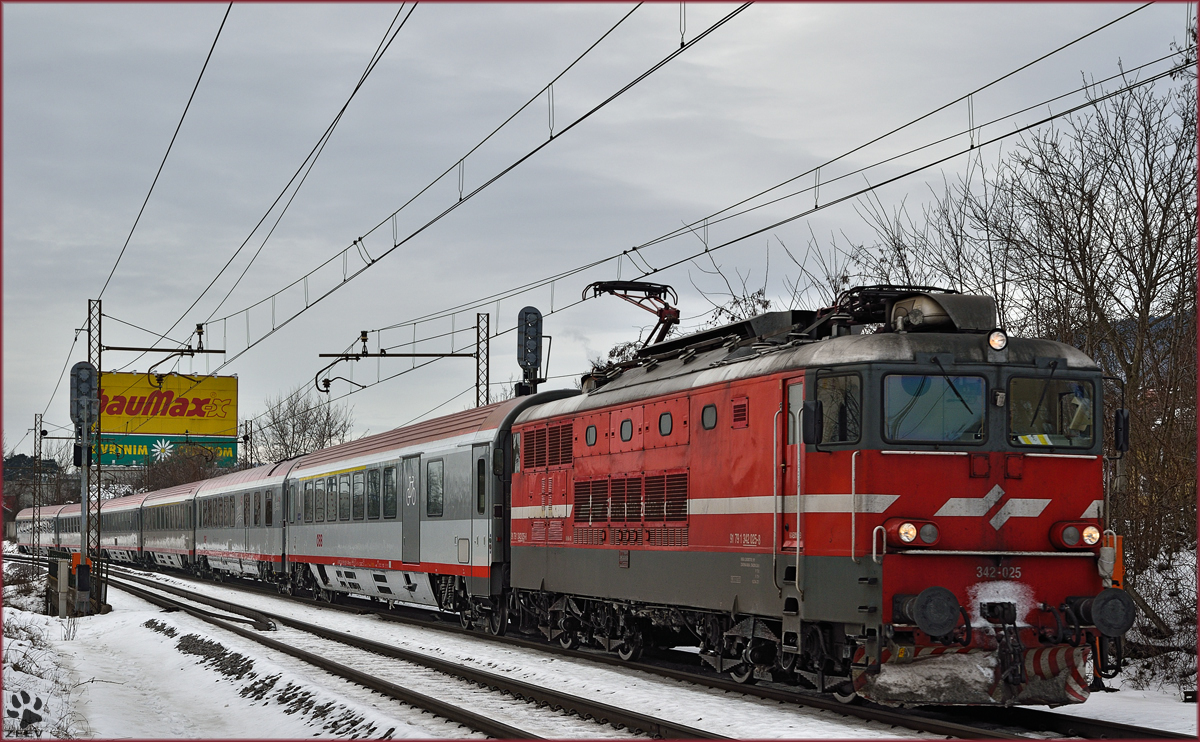 Electric loc 342-025 pull EC158 'Croatia' through Maribor-Tabor on the way to Vienna. /10.2.2015