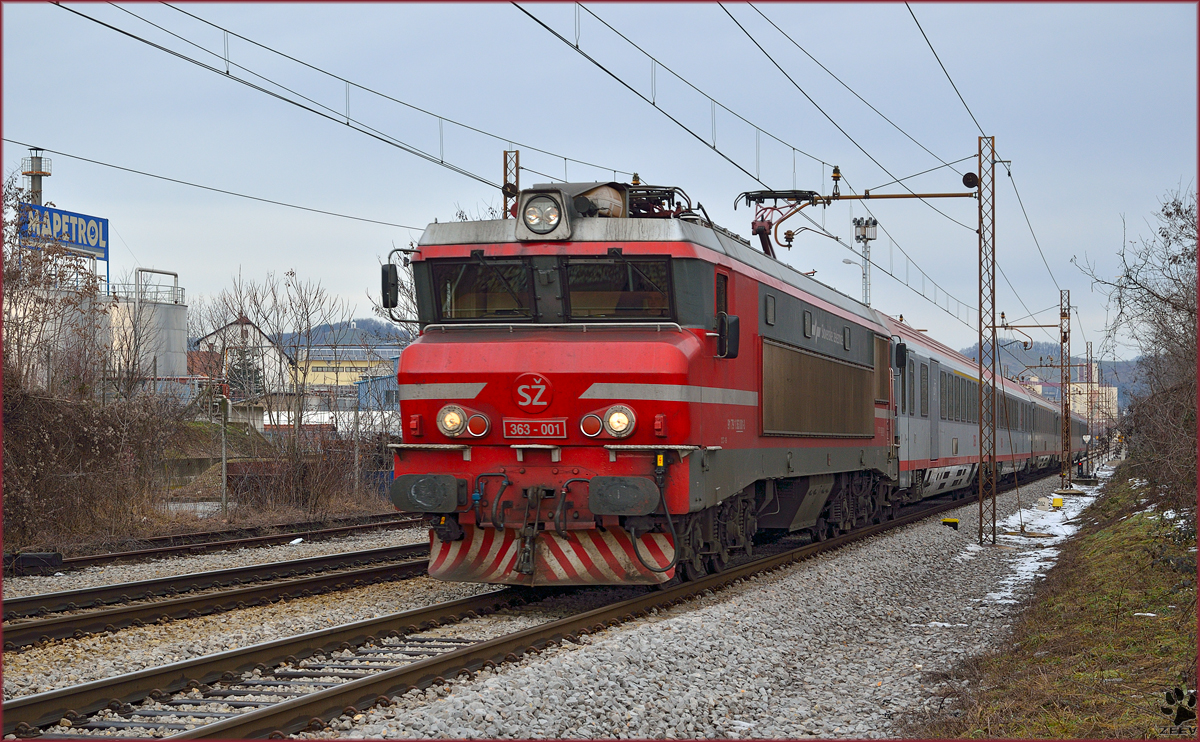 Electric loc 363-001 is hauling EC151 'Emona' through Maribor-Tabor on the way to Ljubljana. /10.2.2014