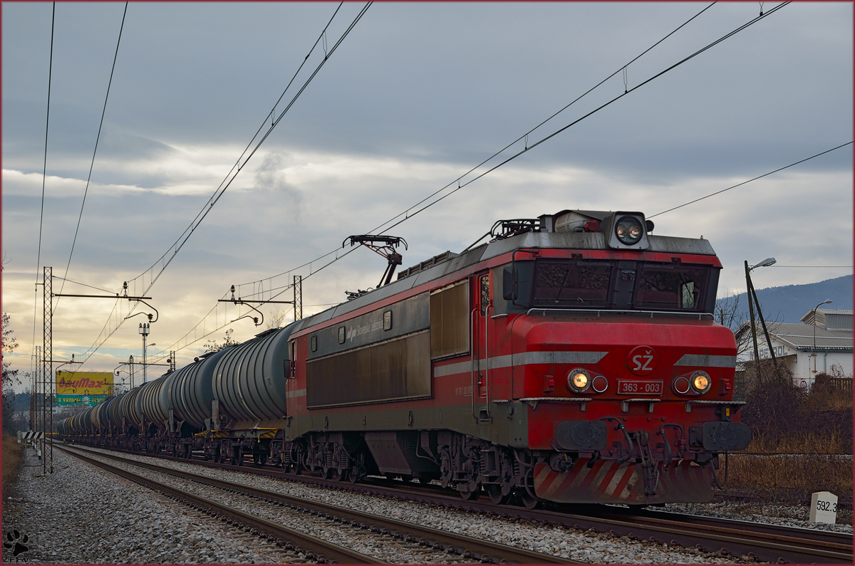 Electric loc 363-003 is hauling freight train through Maribor-Tabor on the way to the north. /20.1.2014