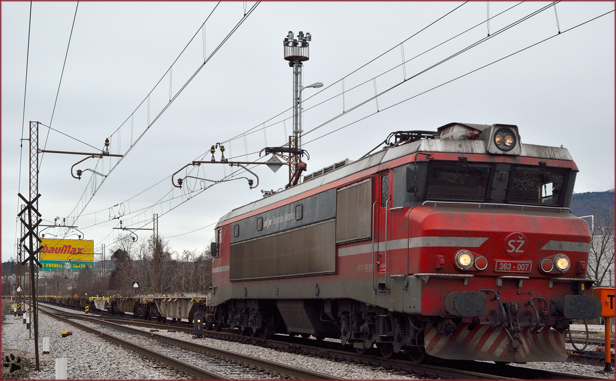 Electric loc 363-007 is hauling freight train through Maribor-Tabor on the way to the north. /27.12.2013
