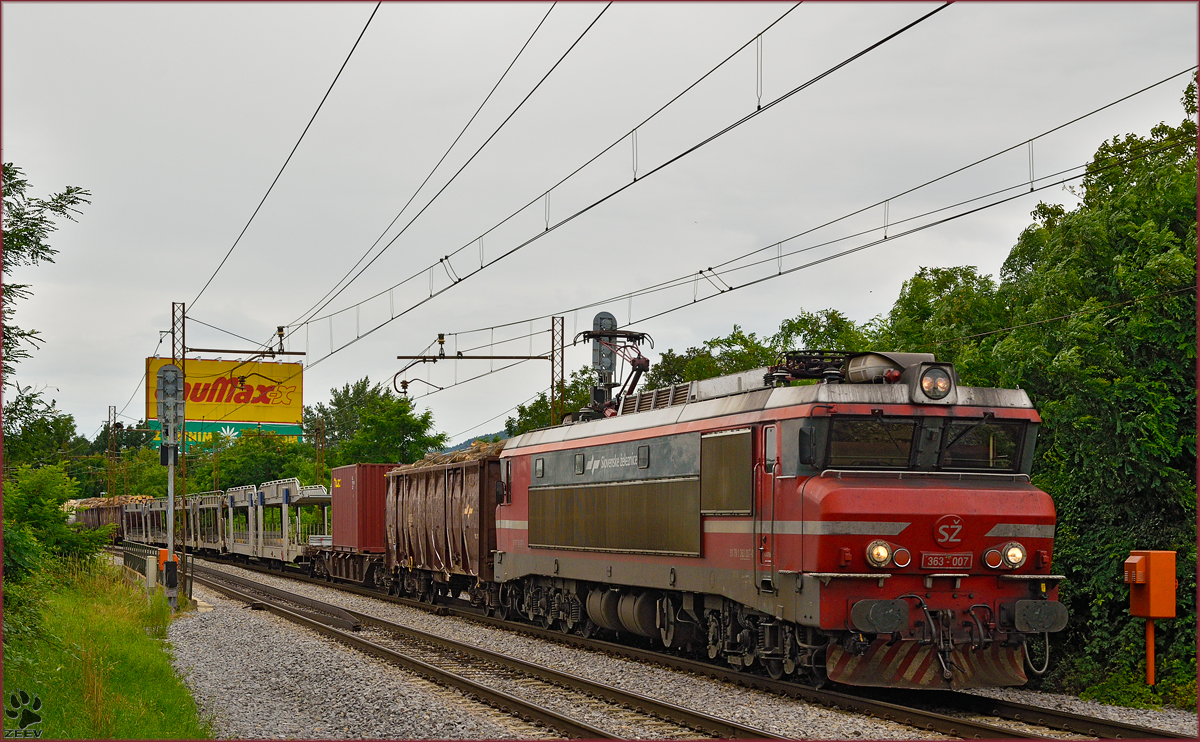 Electric loc 363-007 pull freight train through Maribor-Tabor on the way to the north. /8.7.2014