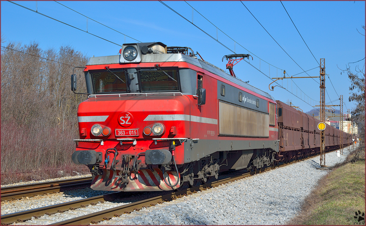 Electric loc 363-015 is hauling freight train through Maribor-Tabor on the way to Koper port. /24.2.2014