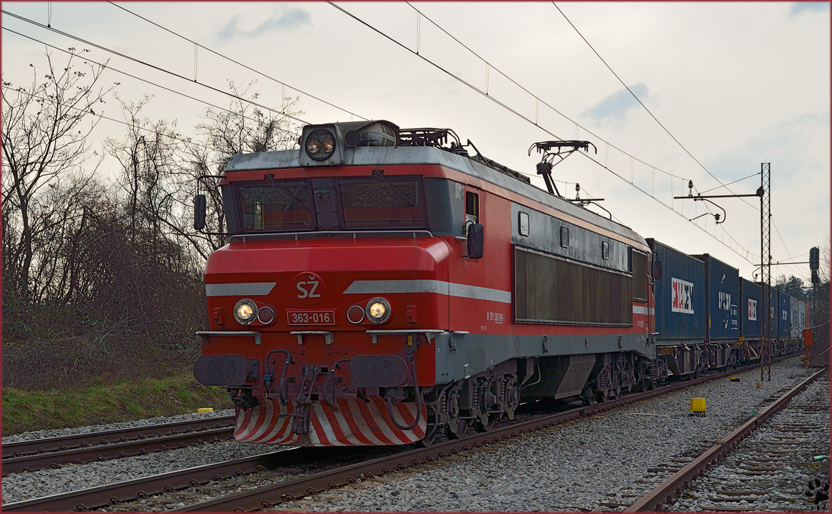 Electric loc 363-016 is hauling container train through Maribor-Tabor on the way to the north. /5.3.2014
