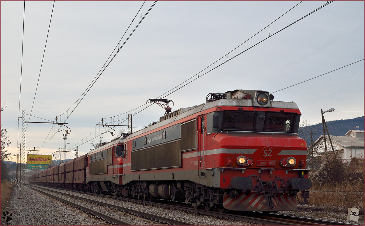 Electric loc 363-030 is hauling freight train through Maribor-Tabor on the way to the north. /7.1.2014