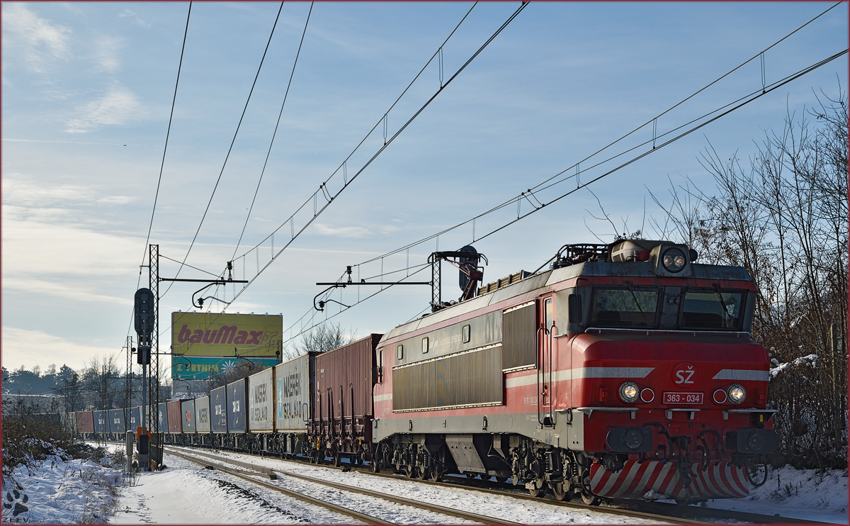 Electric loc 363-034 pull container train through Maribor-Tabor on the way to the north. /2.1.2015
