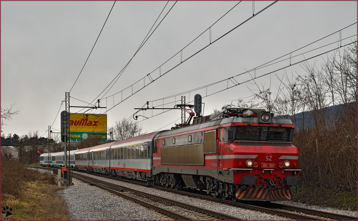 Electric loc 363-034 pull EC158 'Croatia' through Maribor-Tabor on the way to Vienna. /12.3.2015
