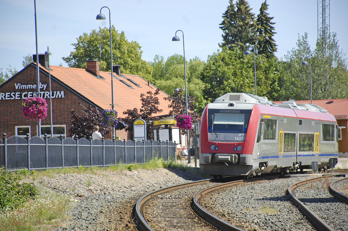 Electric multiple unit Y31 1423 (Bombardier) on the swedish railwayline from Linköping to Kalmar. The train is shot during a stop at the station in Vimmerby, the birthplace of the swedish author Astrid Lindgren. Date: 21. July 2017.