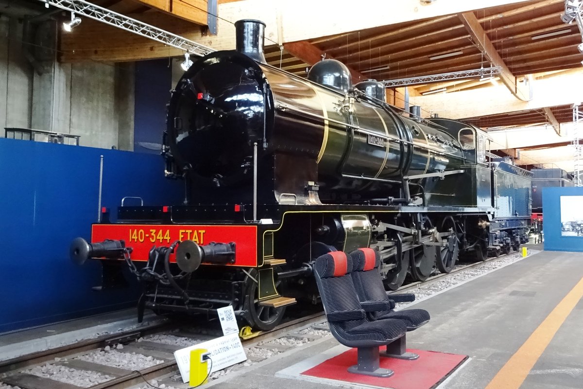 ETAT 140-344 stands in the Cité du Trainj in Mulhouse om 30 May 2019. She was one of a 200 strong order, placed by two British loco building companies because of the need for strong freight locomotives (for troop deployments amongst others). Although build for freight service, these 80 km/h fast engines were often deployed on mundane passenger services. In 1975 the last members of this class went out of service, but 140-344 remains. 