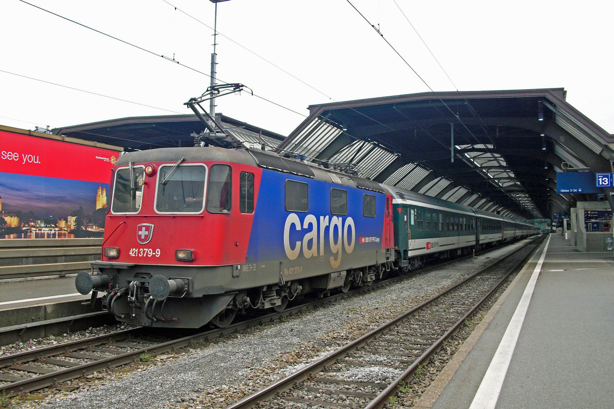 EuroCity to Stuttgart Hbf with reinforcement coaches and 421 379 at the reins departs from Zürich HB on 23 May 2010.