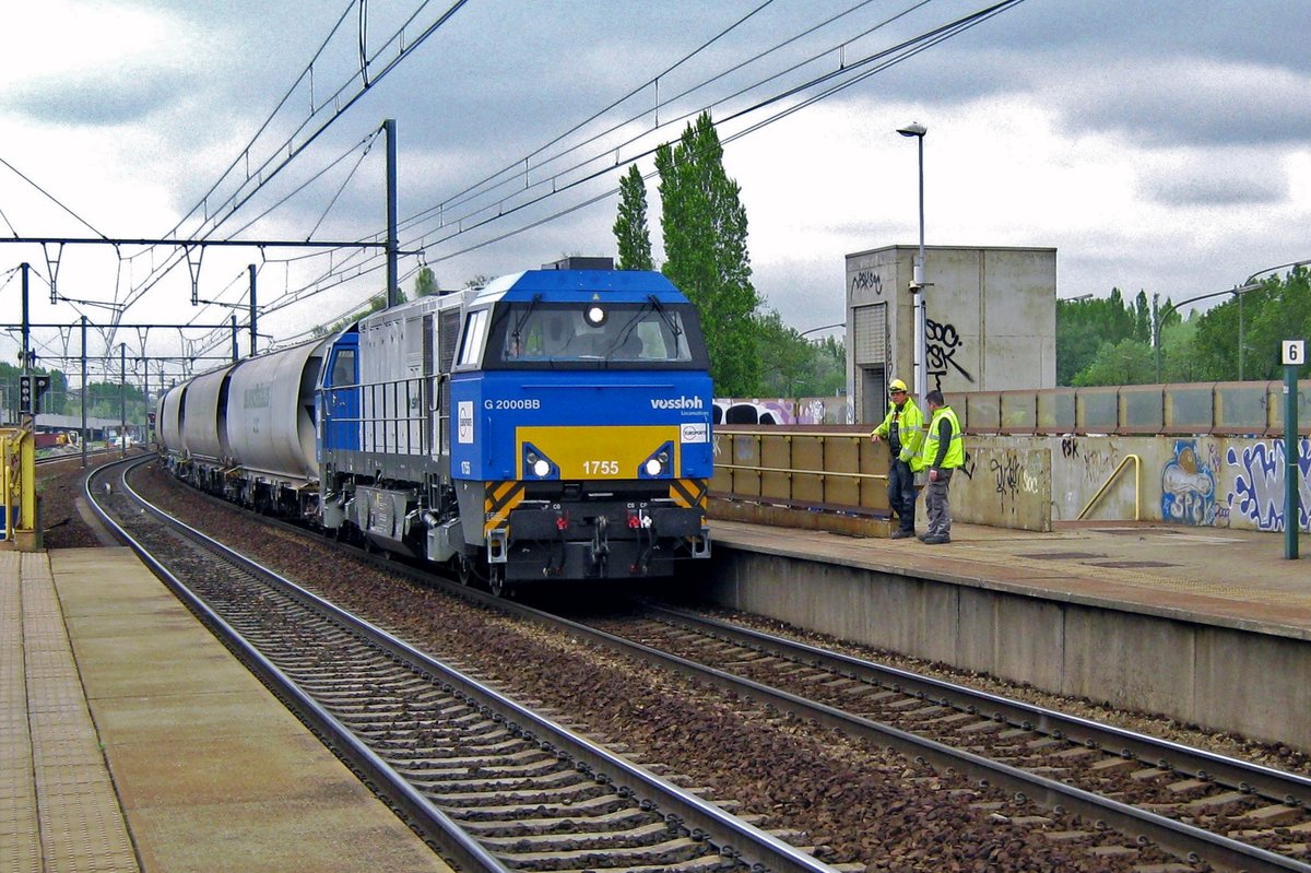EuroPorte 1755 hauls a cereals train through Antwerpen-Luchtbal on 30 May 2013.