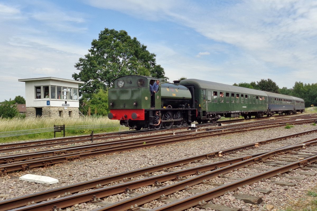 Ex-War Department 75196 -now owned by the Stoomcentrum maldegem SCM- hauls a extra train into Simpelveld on 8 July 2017.