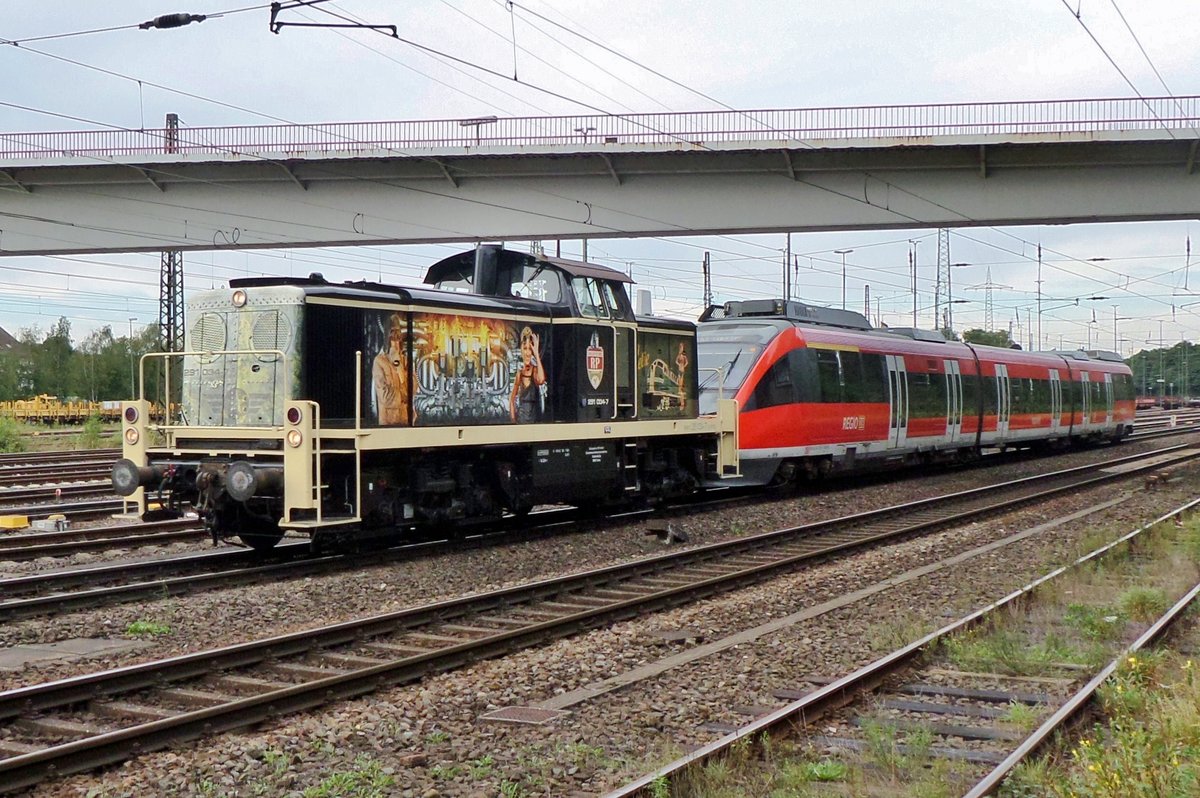 Former DB 291 034 hauls a Talent through the now defunct station of Duisburg-Entenfang on 16 September 2016.