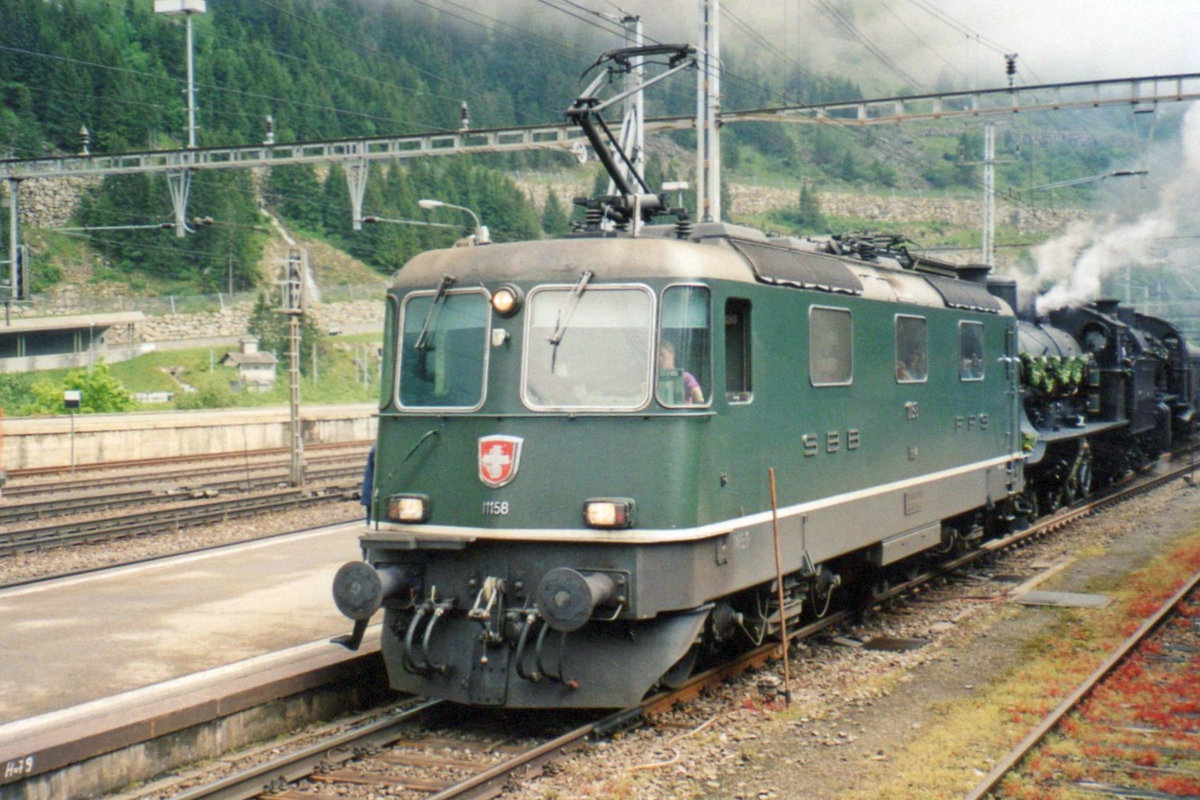 Green 11158 hauls an extra train into Göschenen on 26 May 2007.