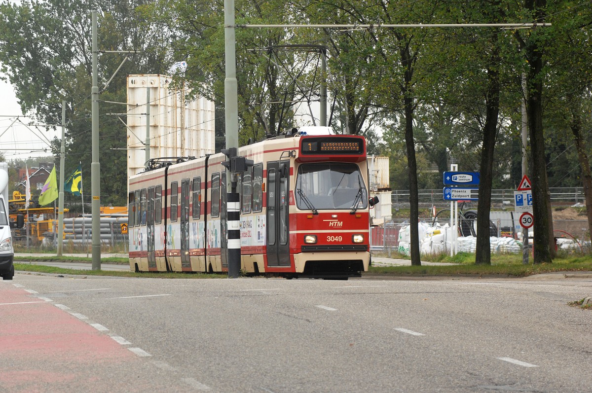 HTM 3049 in Delft. Line 1. The street is going uphill. That's why the tram isn't running equal on the photo.

Date: 9. October 2011.