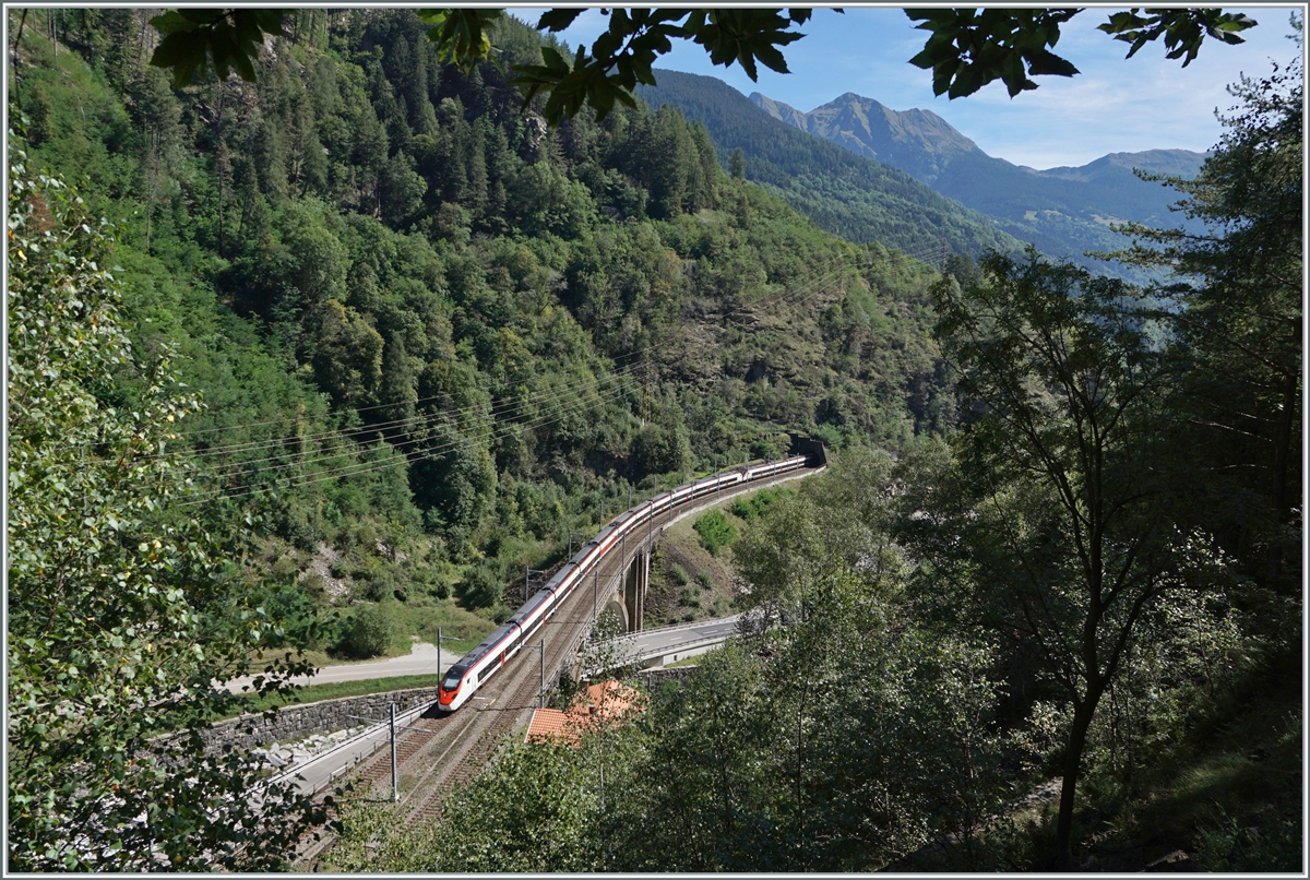 In July 2016 I found this photo location north of Faido, a little above the Broscerina Tunnel with a view of the 103 meter long Polmengo Bridge, which bridges the Ticino River here. But the joy didn't last long, the opening of the Gotthard Bassis Tunnel was imminent and the journey was too long for me for a  measly  TILO Flirt that only runs every hour. But with the unfortunate derailment of a few freight cars a few kilometers from here, but deep under the mountain, traffic on the  Panorama  route begins to pick up again for a few weeks and I drove to Faido: In the picture is a SBB  Giruno  RABe 501 on the way to Lugano. 

Sept. 4, 2023