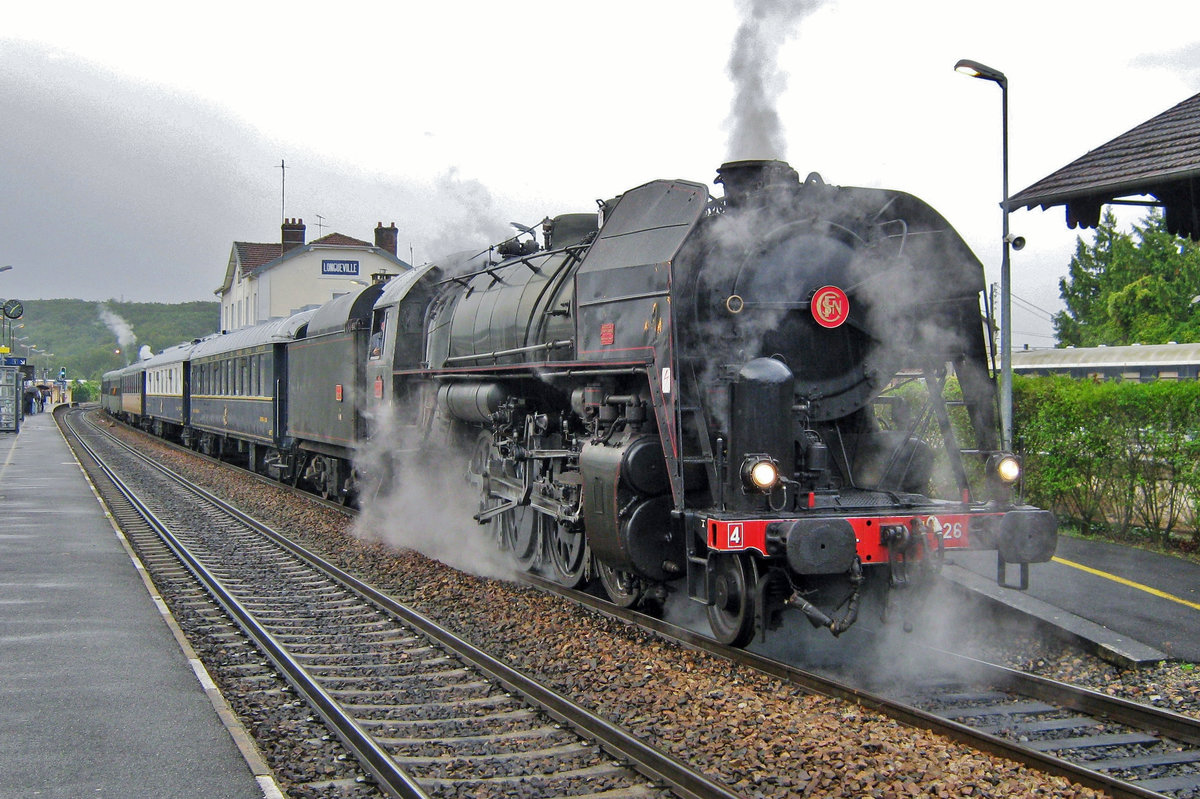 In twilight's  last gleaming, 141R-1126 stands ready with an extra train to Paris est at Longueville on 18 September 2011. 