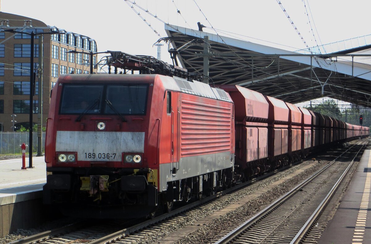 Iron ore trtain headed by 189 036 passes through Tilburg on 23 July 2021.