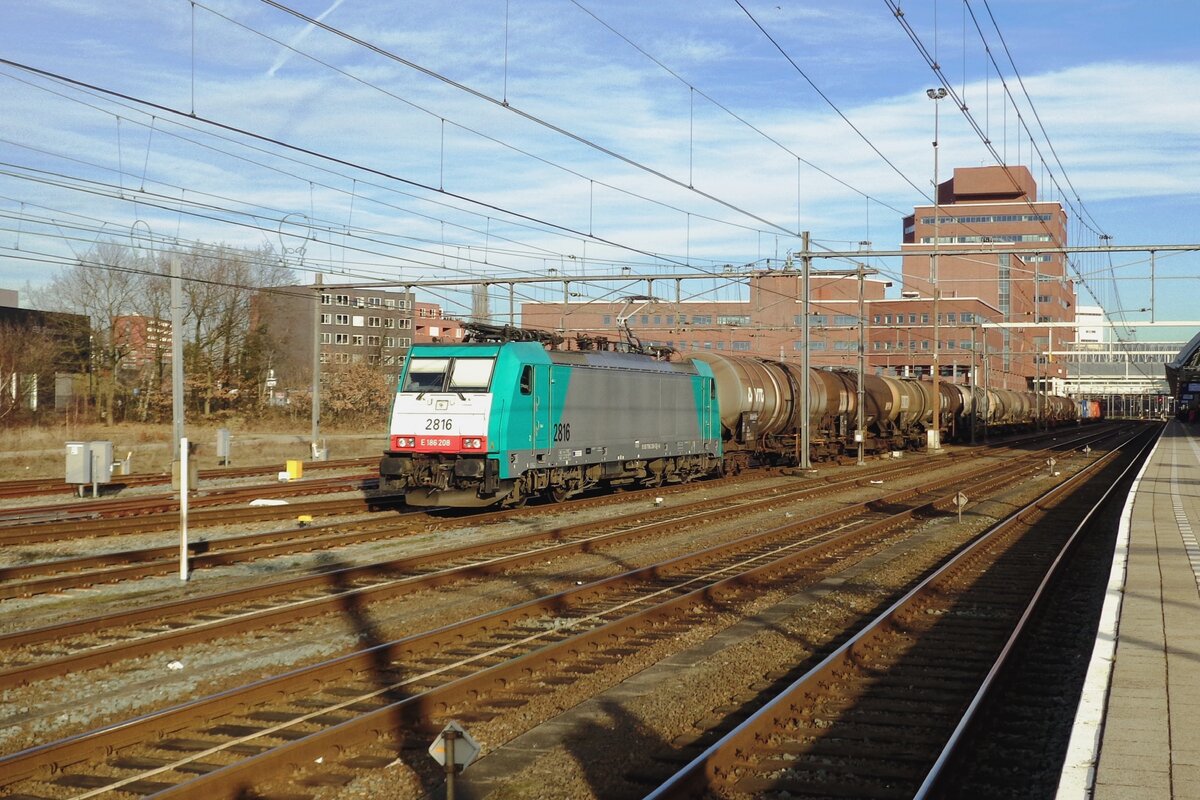 Just before being returned to lease company Alpha Trains (ATLU) Lineas 2816 hauls a tank train through Amersfoort on 24 February 2018.