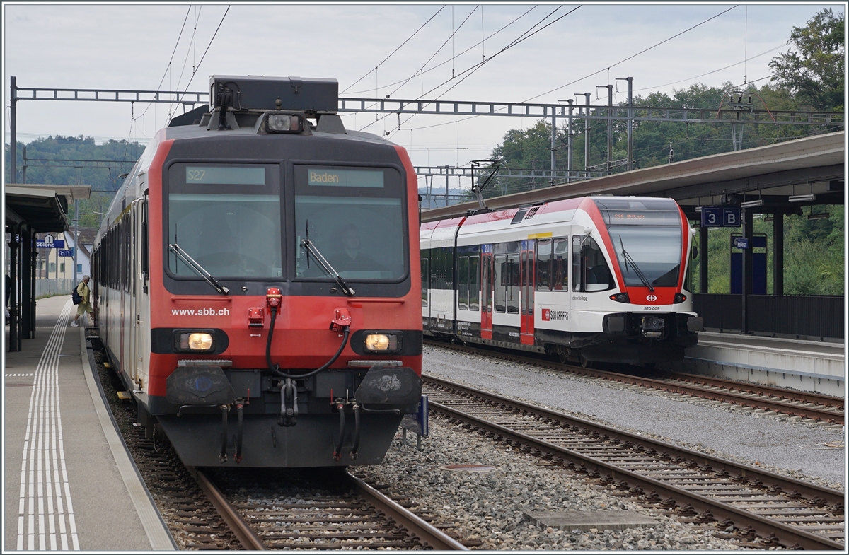 Koblenz: A SBB RBDe 560 to Baden and in the background the GTW RABe 520 009 to Bülach.

06.09.2022