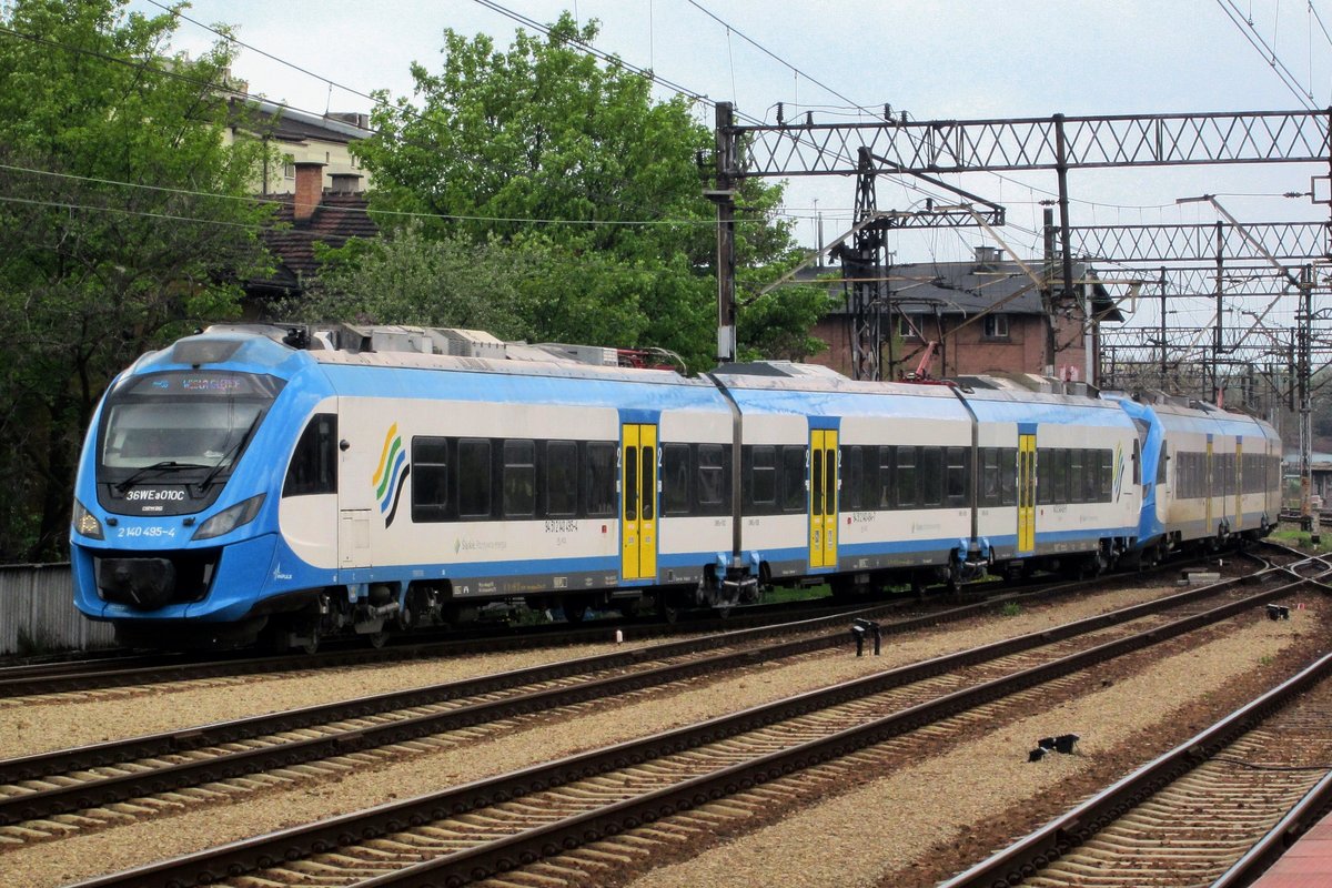 Kolej Slaskie 36WE-010 enters Katowice on 3 May 2016.
