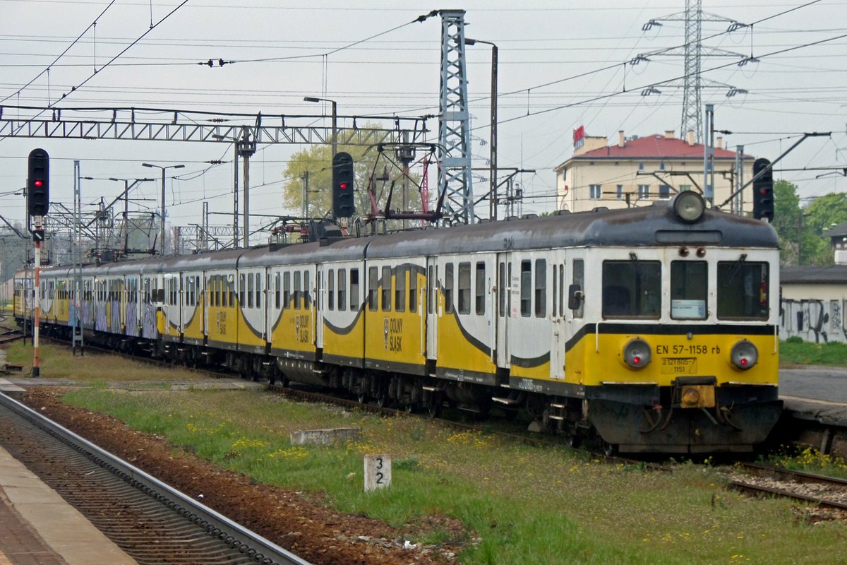 Koleje Dolnoslaskie EN57-1158 finds herself a bit out of reach in Warszawa-Zachodnia on 2 May 2016.