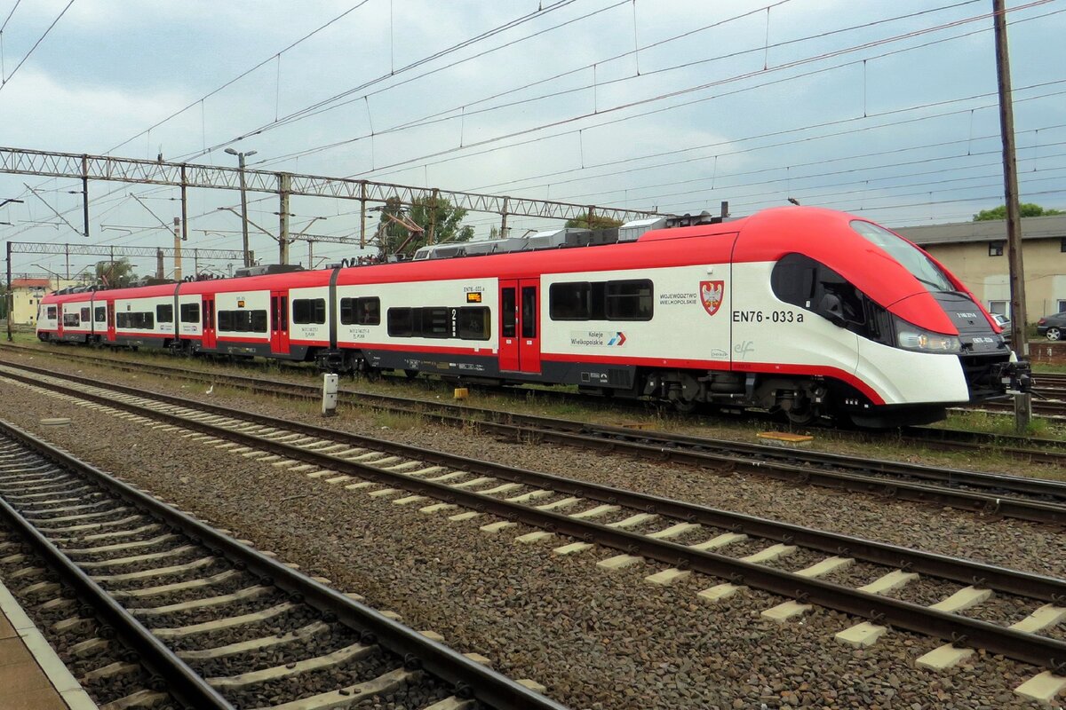 Koleje Wiewlkopolski EN76-033 stands at Poznan Glowny on 22 August 2021.