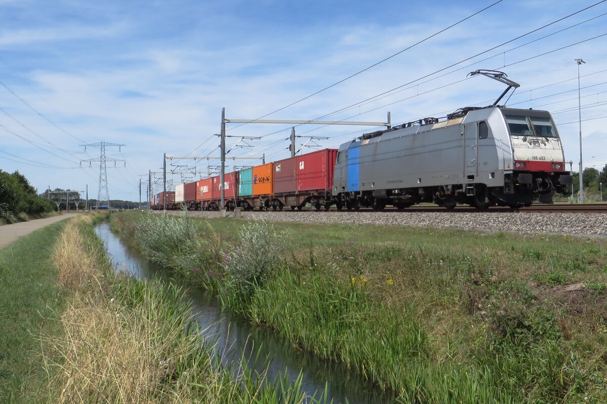 KombiRail Europe 186 493 hauls a container train through Valburg on 28 July 2022.