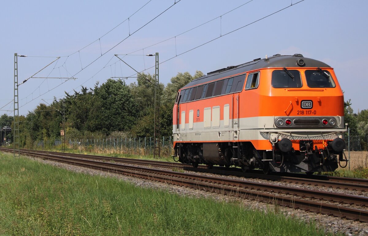 Kübler Heavy Rail's 218 117 passes Kaarst-Broicherheide on 12 August 2025, sporting the experimental Köln CityBahn colours.