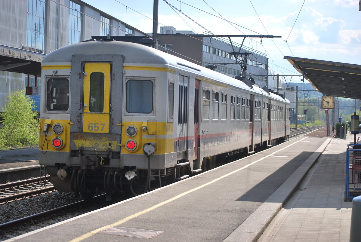 L train to Aachen Hbf (D) leaves Spa station on 7th May 2016.