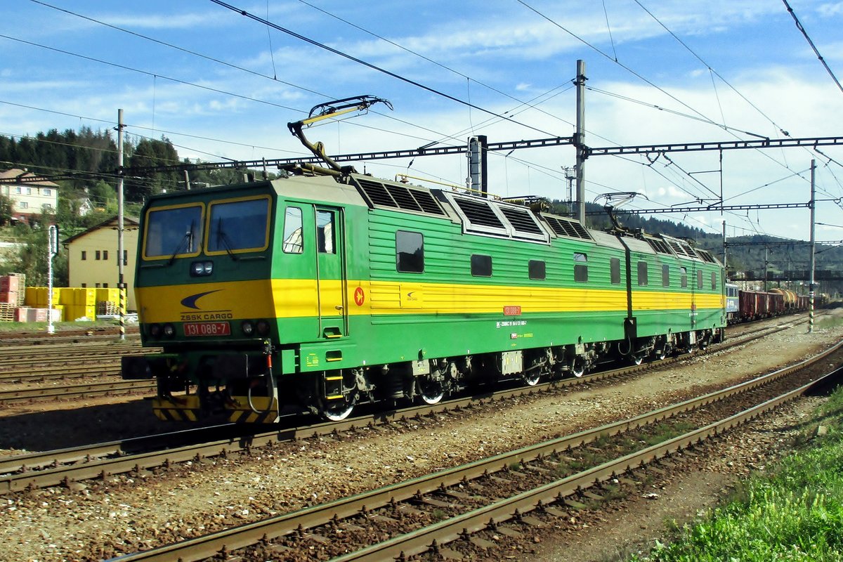 Light running for 131 088 at Cadça on 13 September 2018. At Cadça, the Slovak border station with the Czech Republic, coal train to Zilina and further are hauled by one or two of these double locos and receive banking from a third example. This loco is to bank a coal train headed by 131 006.