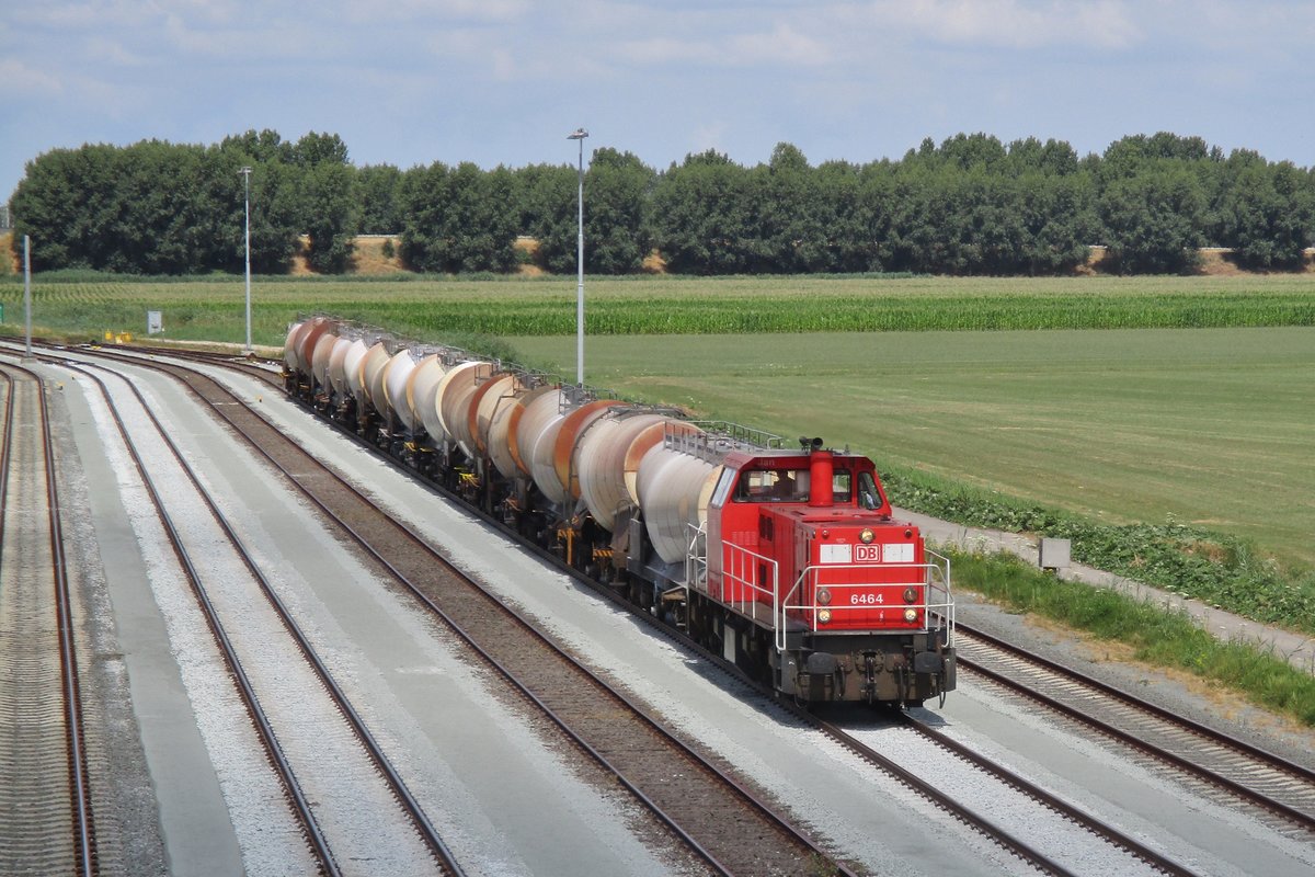 Lime slurry train headed by 6464 enters Lage Zwaluwe on 18 July 2019.