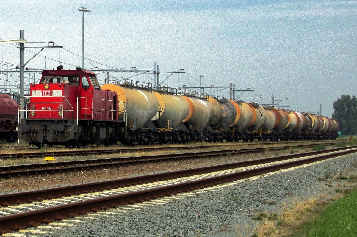 Lime slurry train headed by 6416 enters Lage Zwaluwe on 24 July 2015.