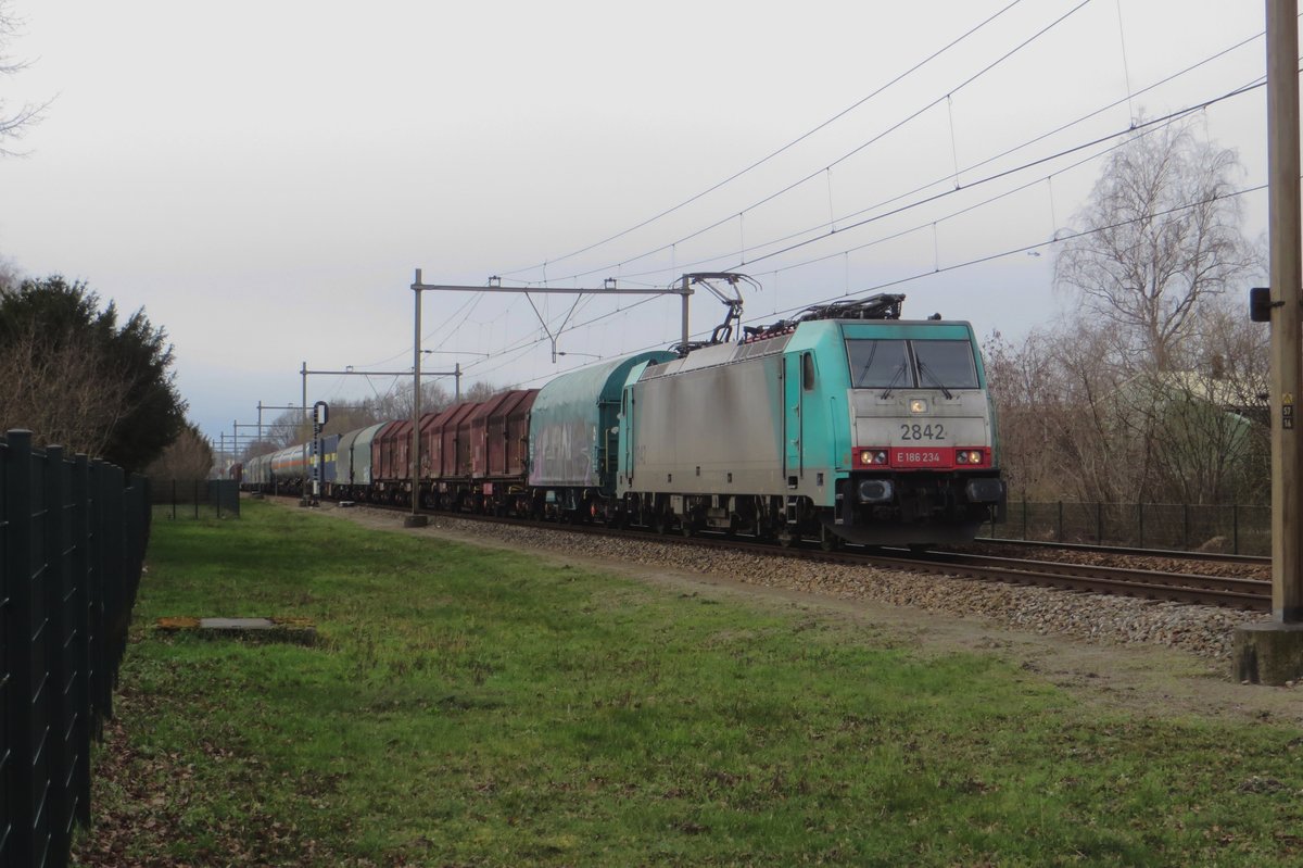 LNS 2842 hauls a mixed freight through Alverna on 16 March 2021.