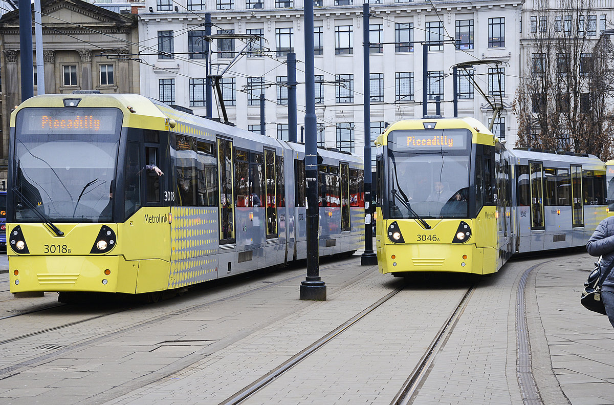 Manchester Metro Link Trams 3018 and 3046 (Bombardier M5000) at Piccadilly Gardens. Date: March 11, 2018.
