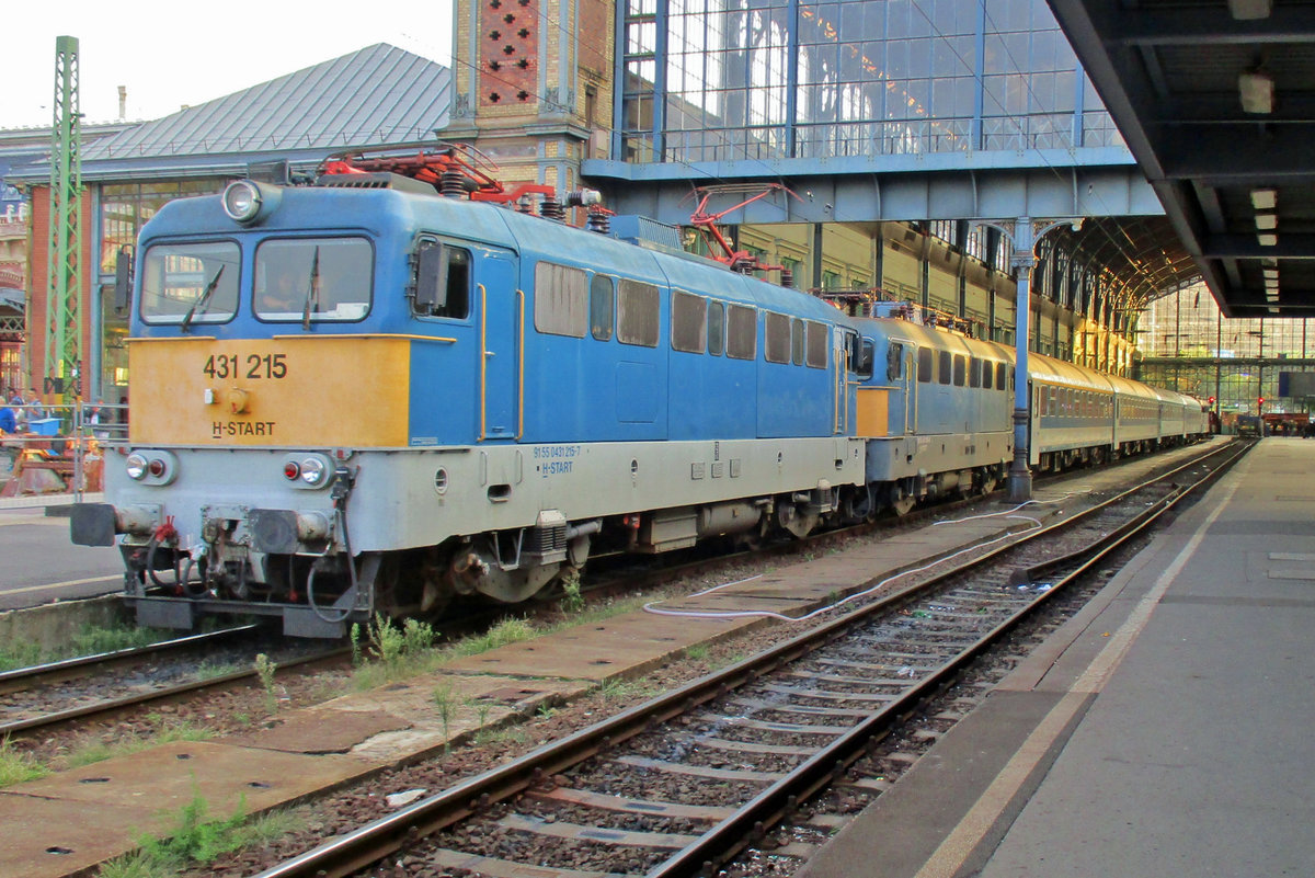 MAV 431 215 with dead sister and an IC to Miskolc stands ready for departure at Budapest-Nyugati on 18 September 2017.