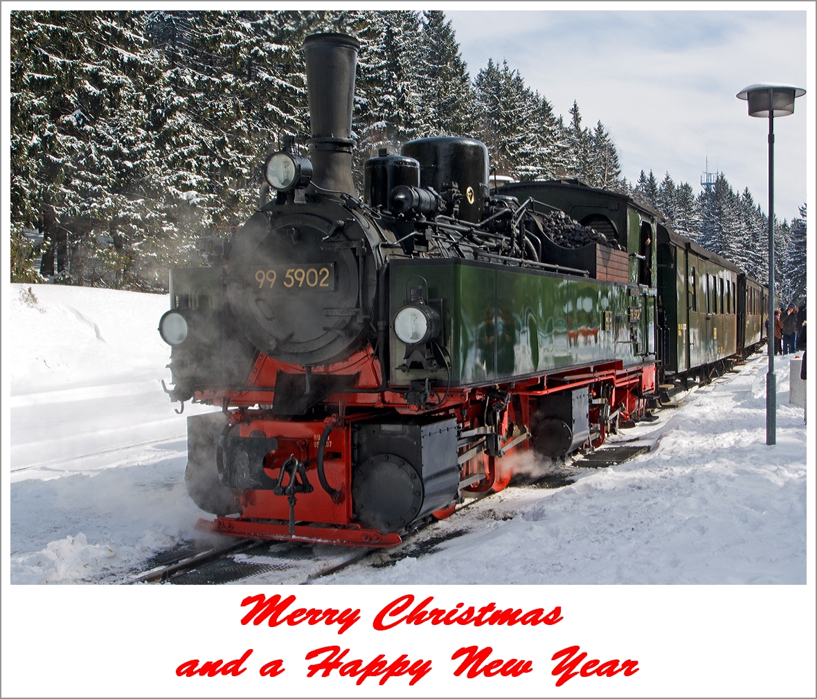 Merry Christmas and a Happy New Year  

I myself wish for peace all over the world!

The picture:
The Jung-Malletlok 99 5902 on 23.03.2013 at the stop in in the station of Schierke.
The locomotive was built ad 1898 by Arnold Jung Locomotive Factory in Jungenthal at Kirchen/Sieg under the serial number 261.
