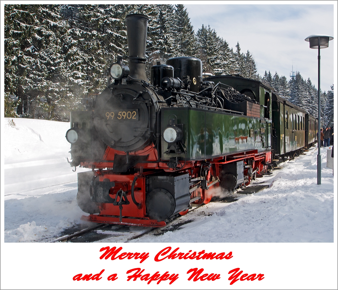 Merry Christmas and a Happy New Year  

I myself wish for peace all over the world!

The picture:
The Jung-Malletlok 99 5902 on 23.03.2013 at the stop in in the station of Schierke.
The locomotive was built ad 1898 by Arnold Jung Locomotive Factory in Jungenthal at Kirchen/Sieg under the serial number 261.