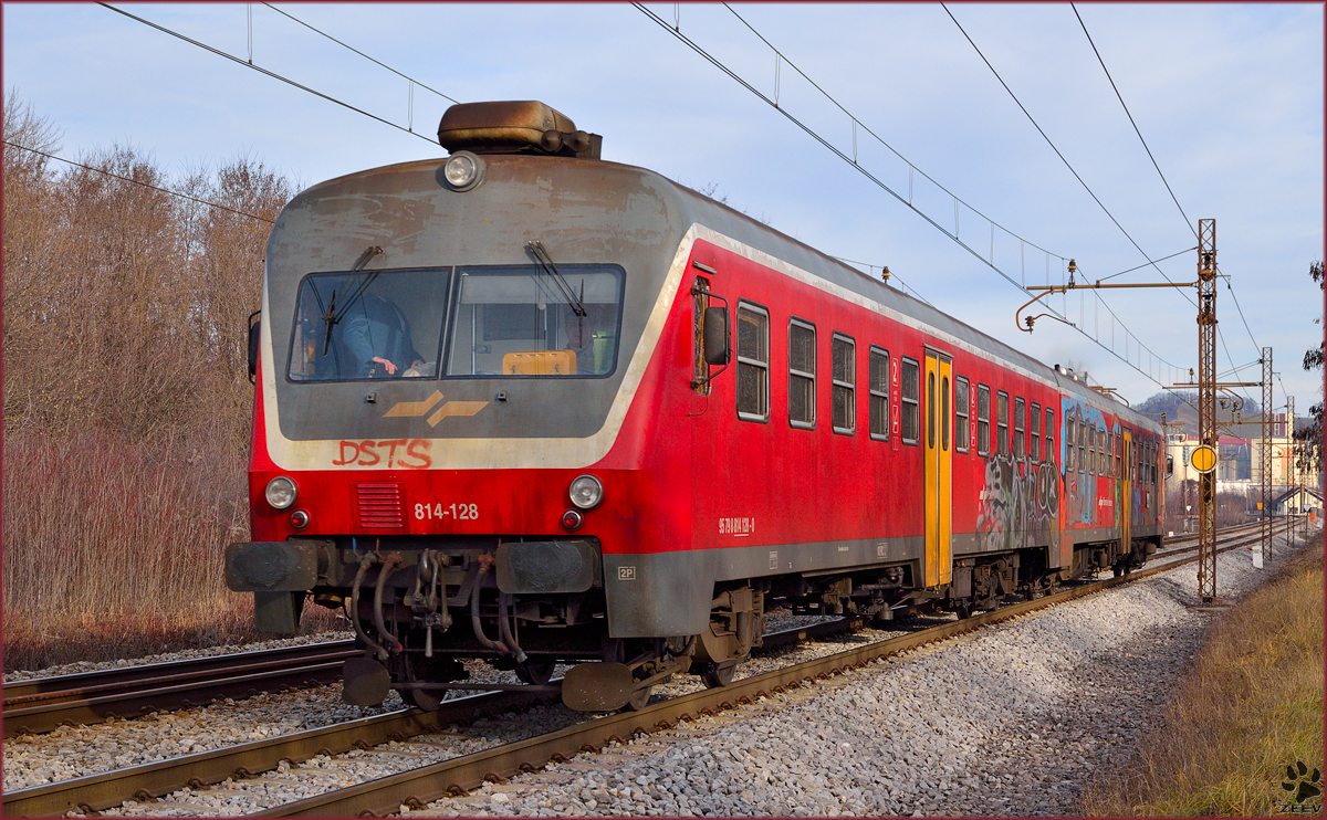 Multiple unit 814-128 is running through Maribor-Tabor on the way to Ormož. /2.1.2014