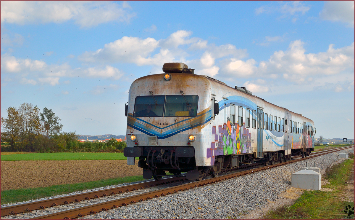 Multiple unit 8813-130 is running near Podvinci on the way to Pragersko. /25.10.2013