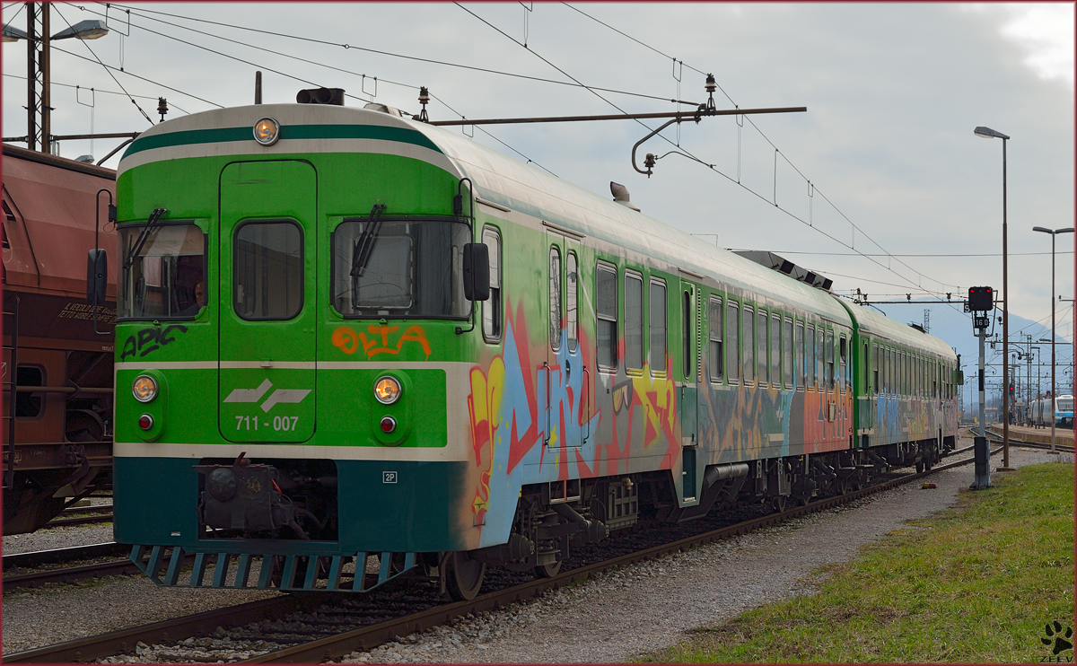 Multiple units 711-007 are leaving Pragersko on the way to Murska Sobota. /21.2.2014