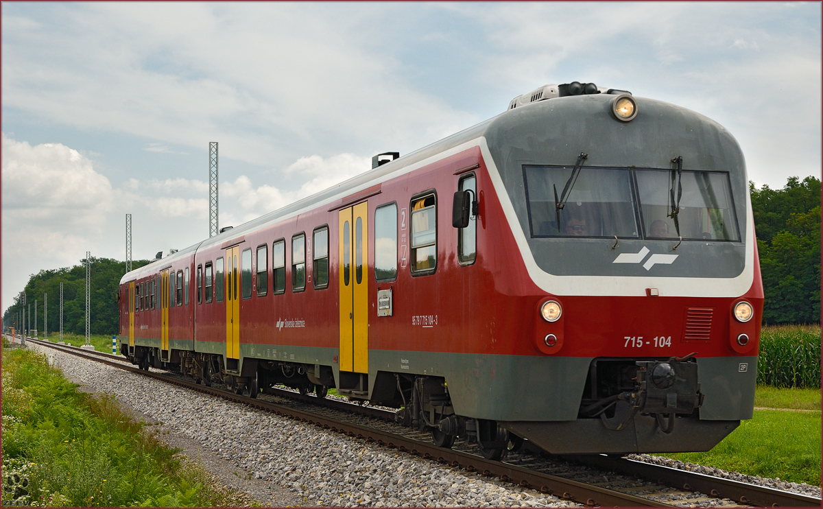 Multiple units 715-104 run through Cirkovce-Polje on the way to Maribor. /29.7.2014