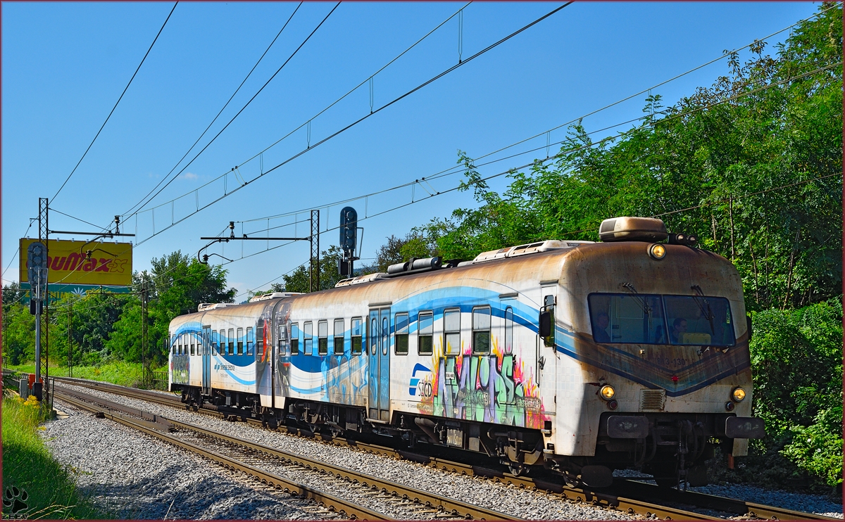 Multiple units 813-130 run through Maribor-Tabor on the way to Maribor station. /28.8.2016