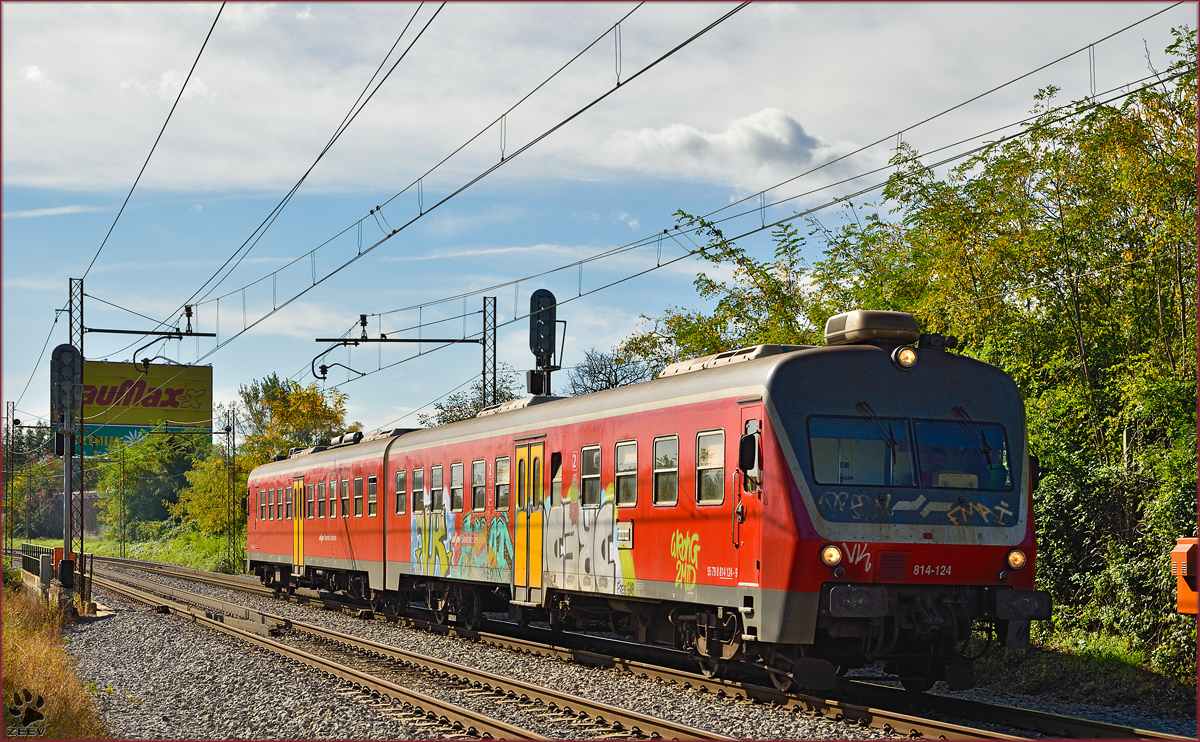 Multiple units 814-124 run through Maribor-Tabor on the way to Maribor station. /14.10.2014