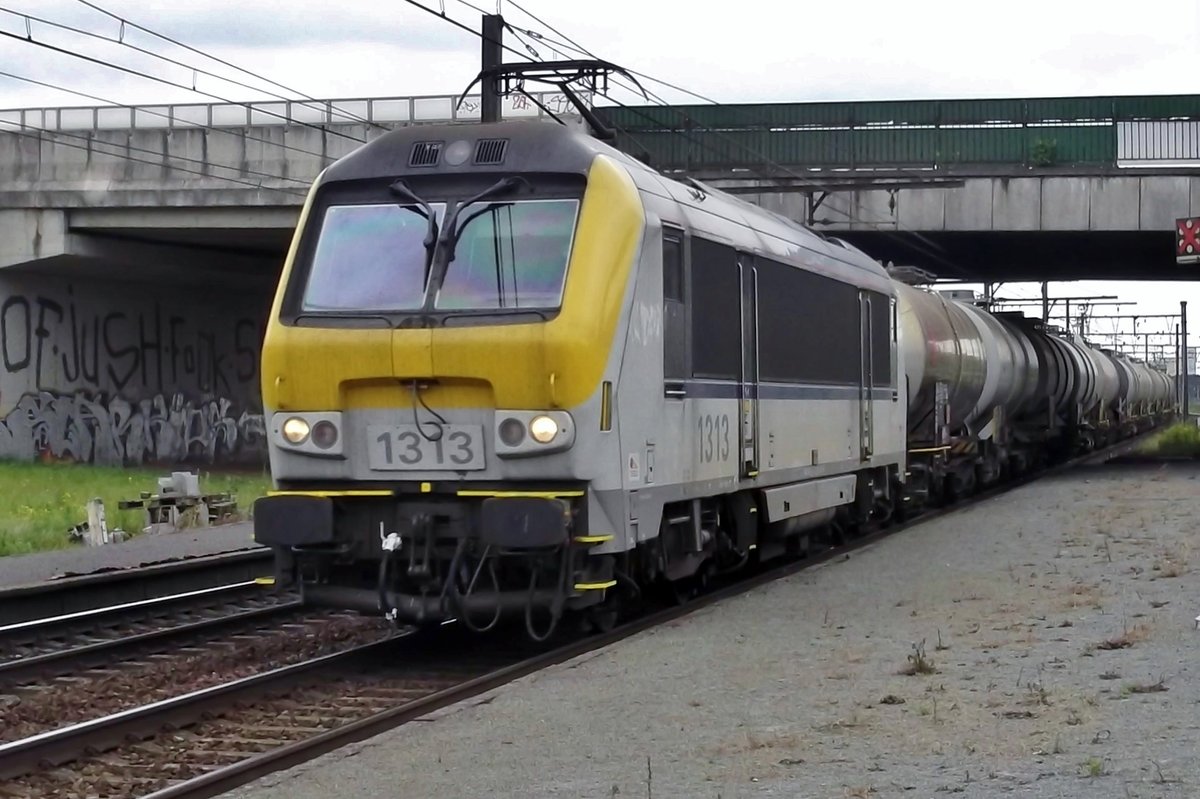 NMBS 1313 hauls a tank train through Antwerpen-Noorderdokken on 19 June 2014.