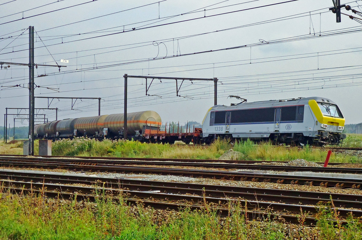 NMBS 1338 hauls a mixed freight through Ekeren on 30 May 2013.