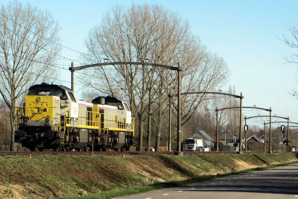 NMBS 7780 is hauled through Boxtel toward Visé on 24 February 2021.