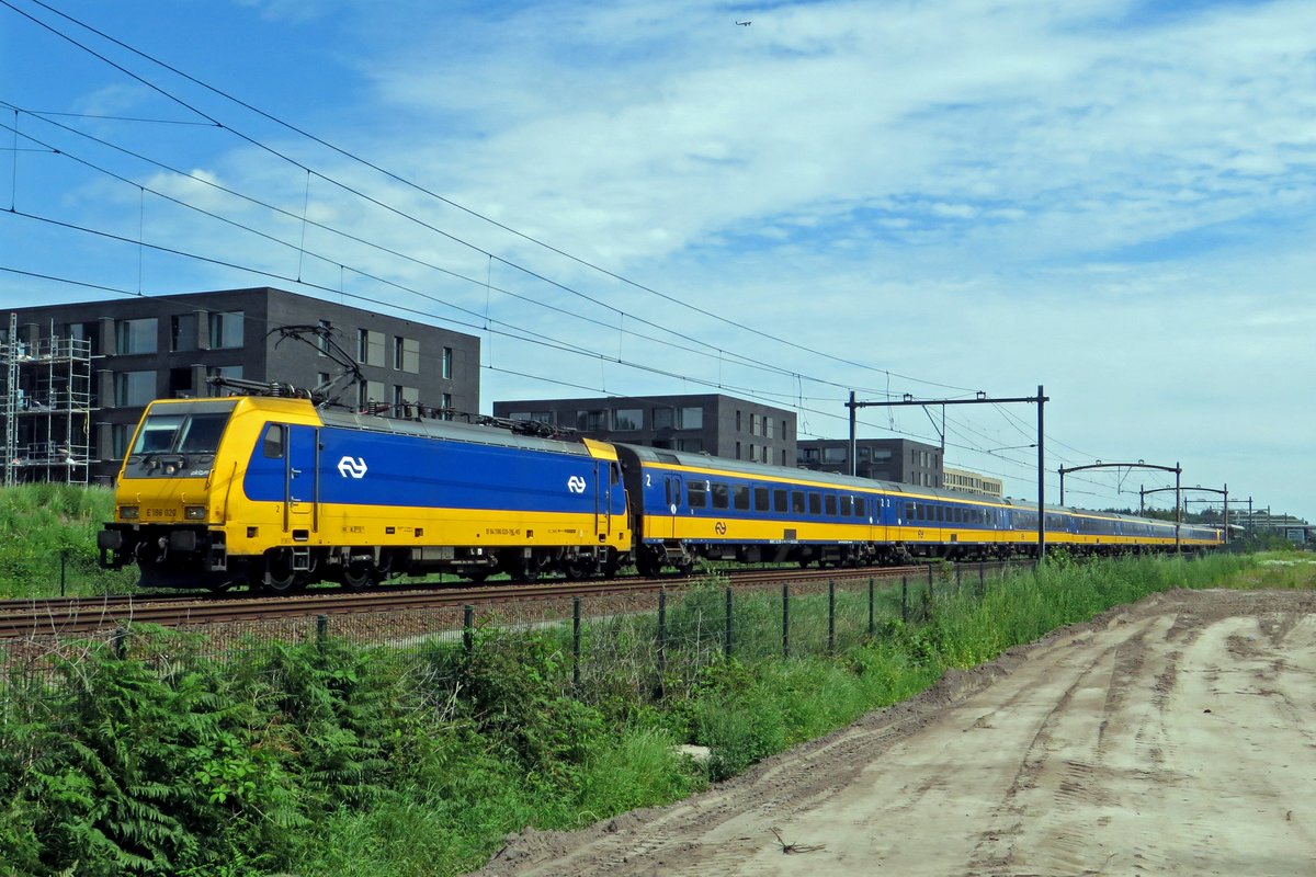 NS 186 020 speeds with an IC service to Den Haag pas Tilburg Reeshof on 19 July 2020.