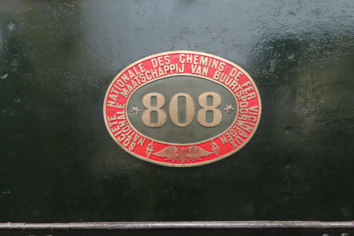Number shield of SNCV (Societé Nationale des Chemins Vicinales) 808 seen in Treignes on 22 September 2023.