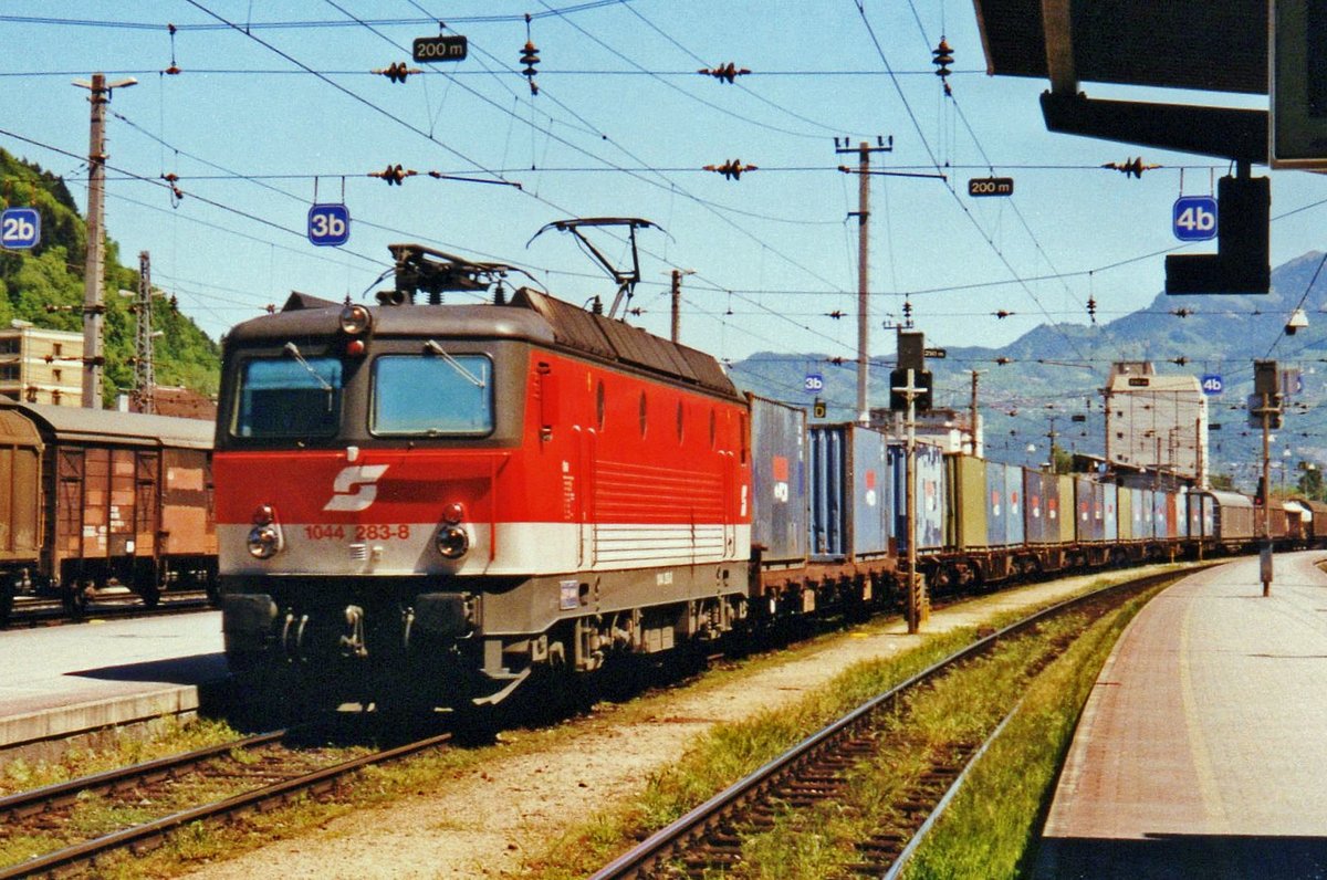 ÖBB 1044 283 hauls a container train through Feldkirch on 27 May 2002.